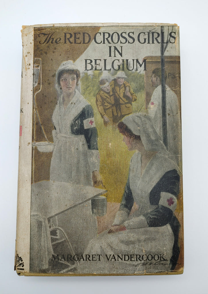 Dust jacket of the first edition of Vandercook's The Red Cross Girls in Belgium (1916)