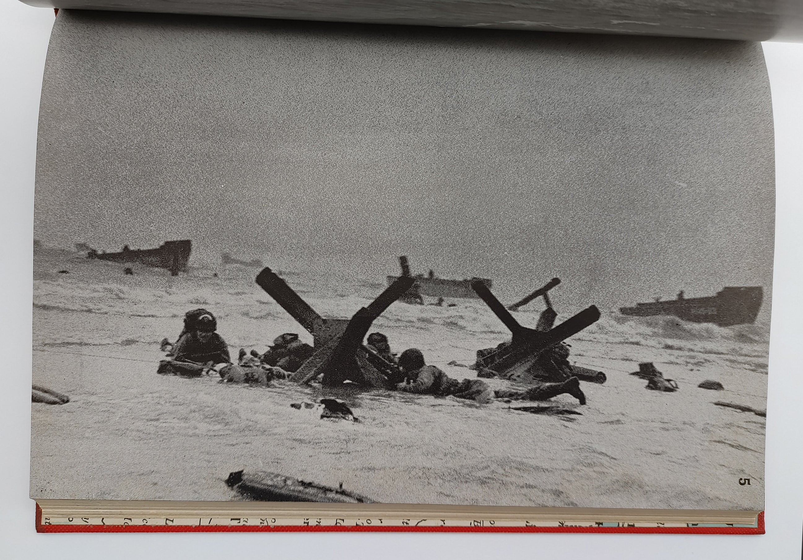 Classic D-Day photograph from the first edition of Wertenbaker's Invasion! (1944) with photographs by Robert Capa