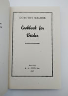 Title page of the first edition of Malone's Cook Book for Brides (1947)