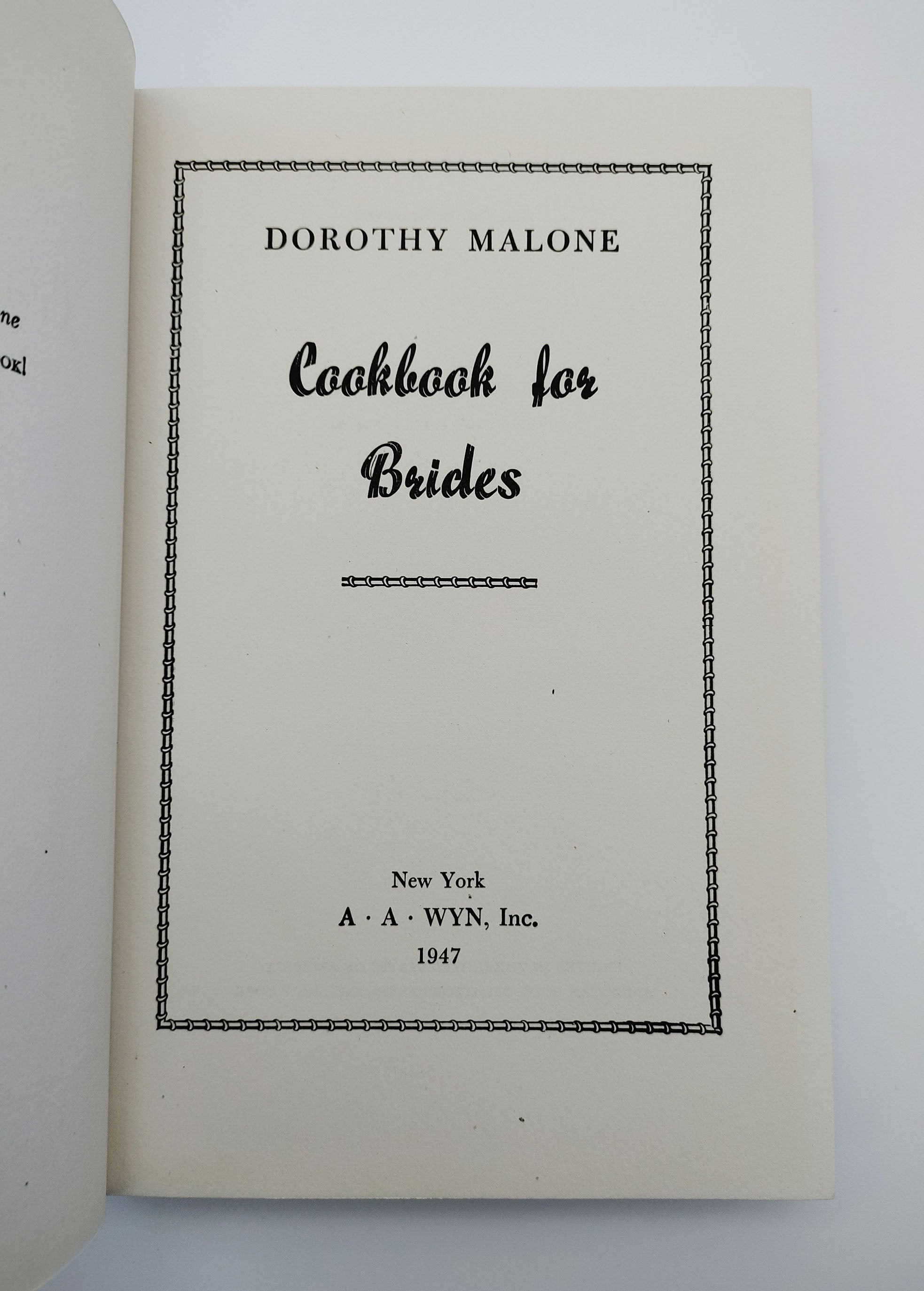 Title page of the first edition of Malone's Cook Book for Brides (1947)