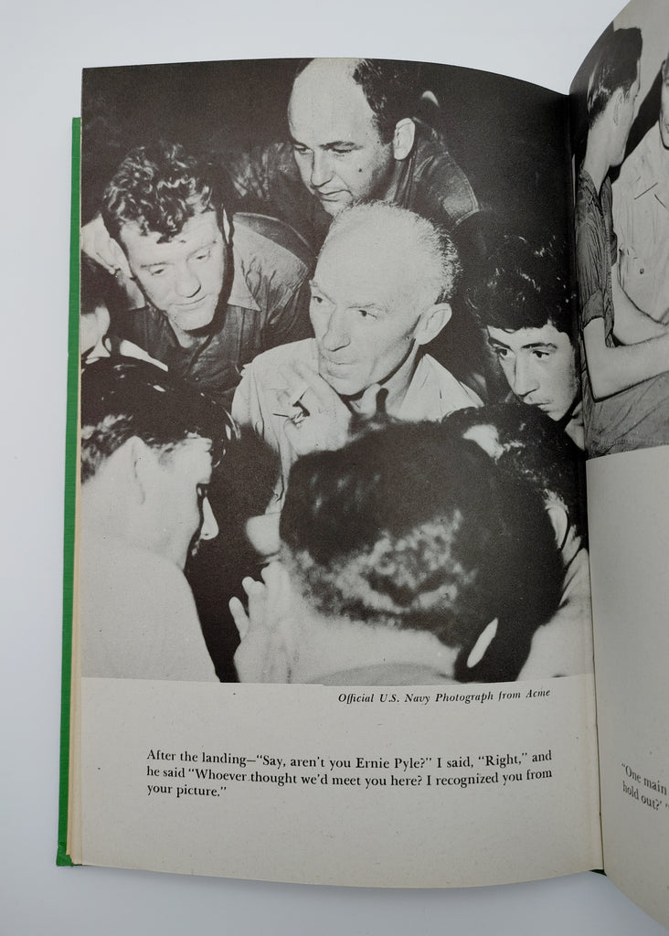 Picture of Ernie Pyle surrounded by soldiers from Pyle's Last Chapter (1946)