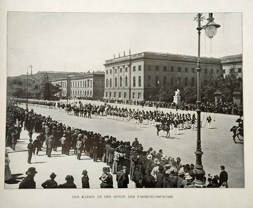 Photograph of a military parade down the street in Berlin from Album von Berlin (1907)