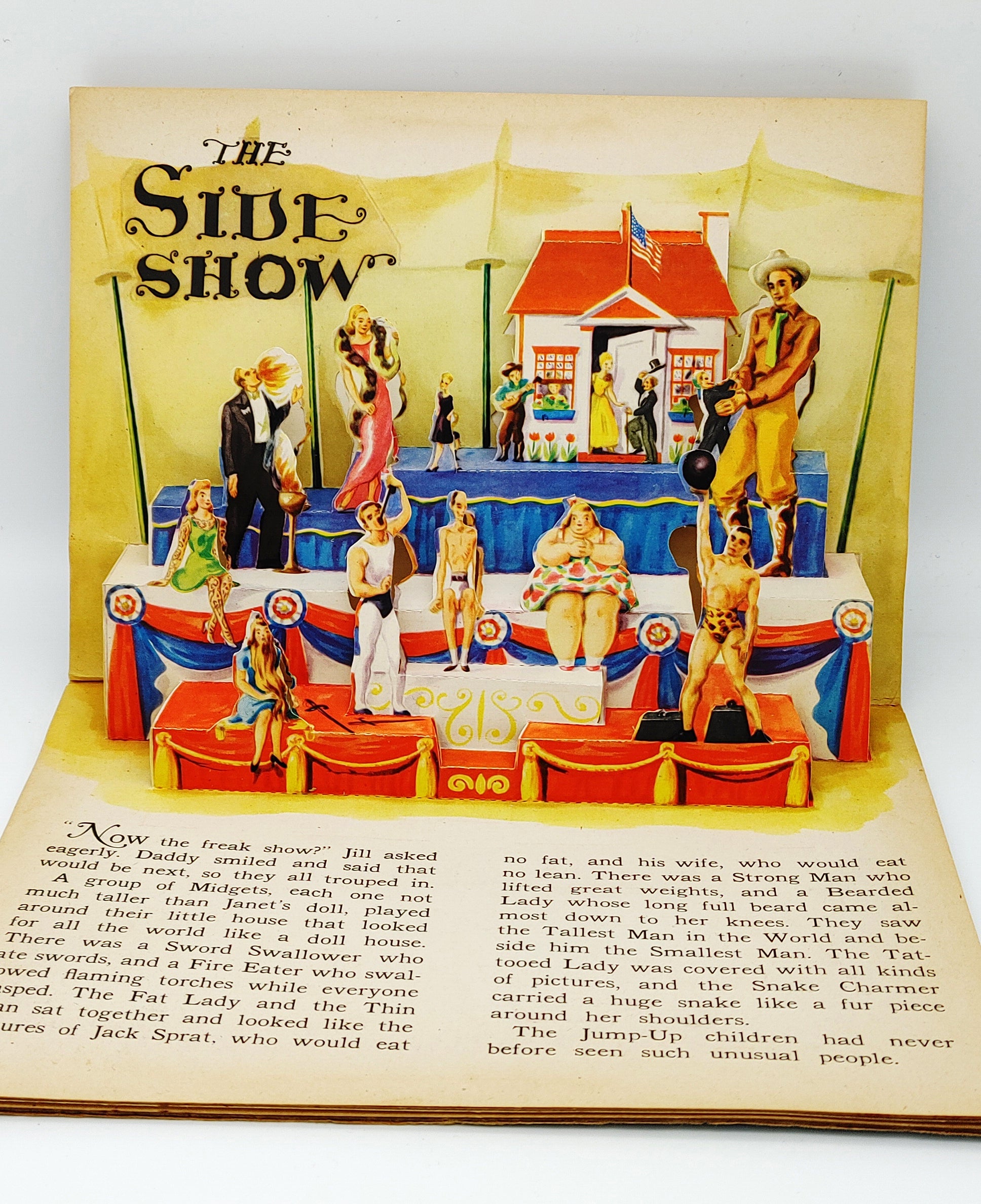 Pop-up illustration of a side show at a circus from Geraldine Clyne's The Jolly Jump-Ups See the Circus (1944)