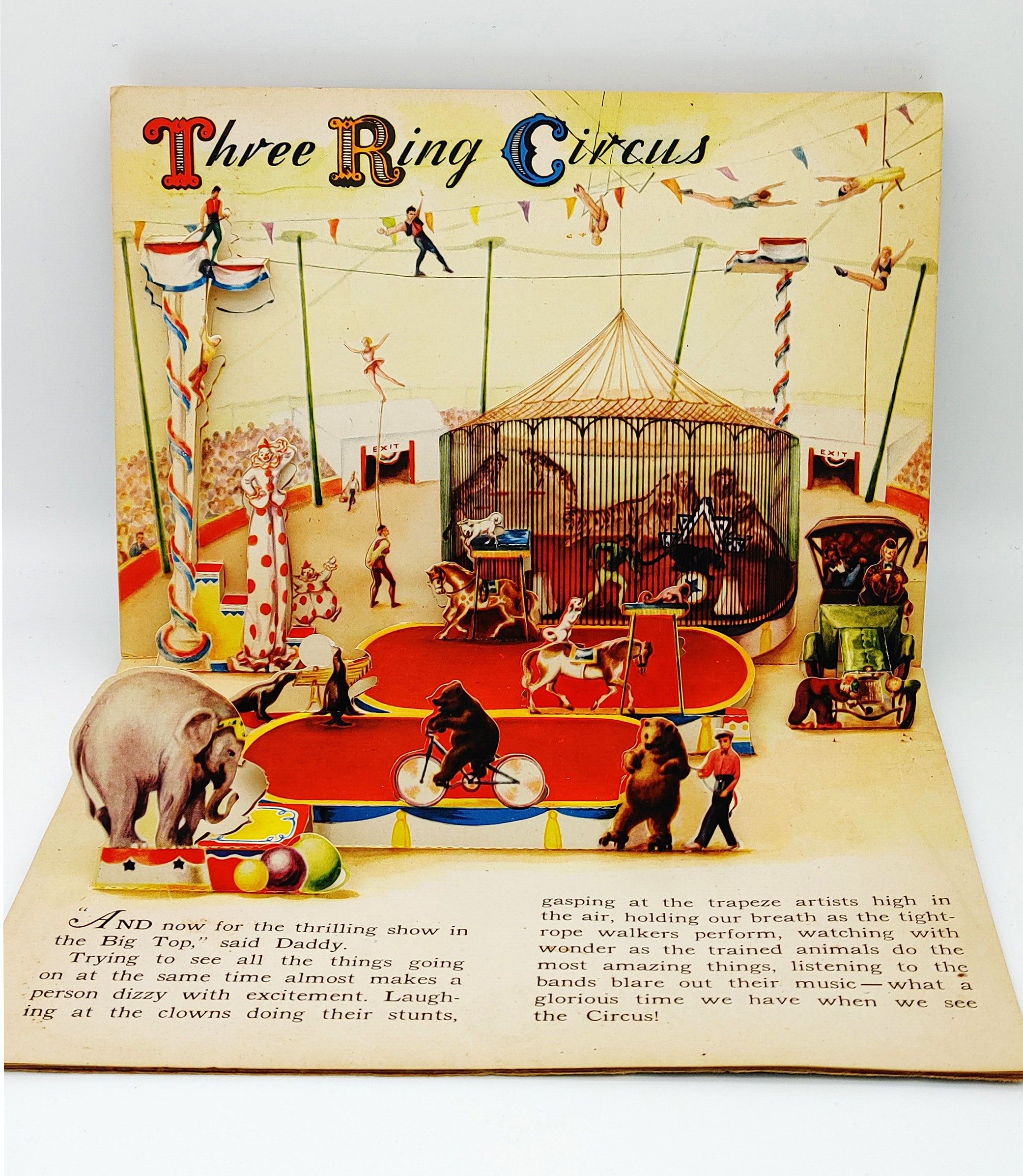 Pop-up illustration of the three ring circus (elephant, cycling bear) from Geraldine Clyne's The Jolly Jump-Ups See the Circus (1944)