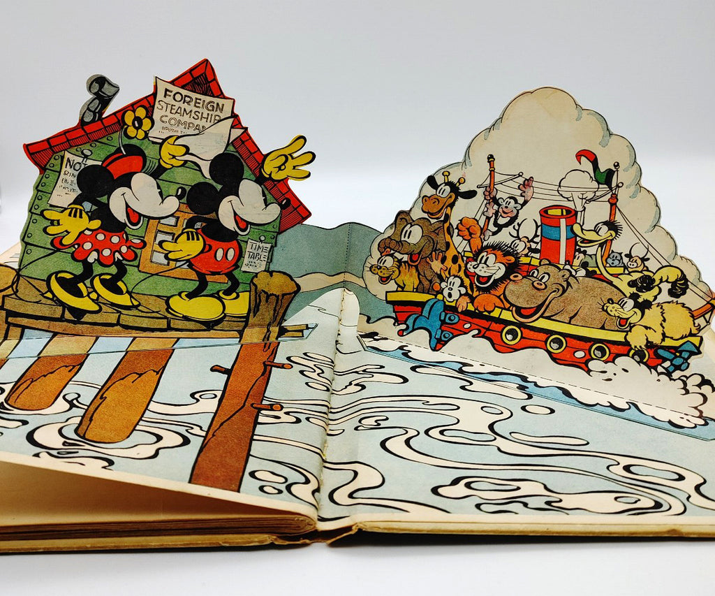 Pop-up illustration of Mickey and Minnie Mouse waving at a steamship from Blue Ribbon's The "Pop-Up" Mickey Mouse (1933)