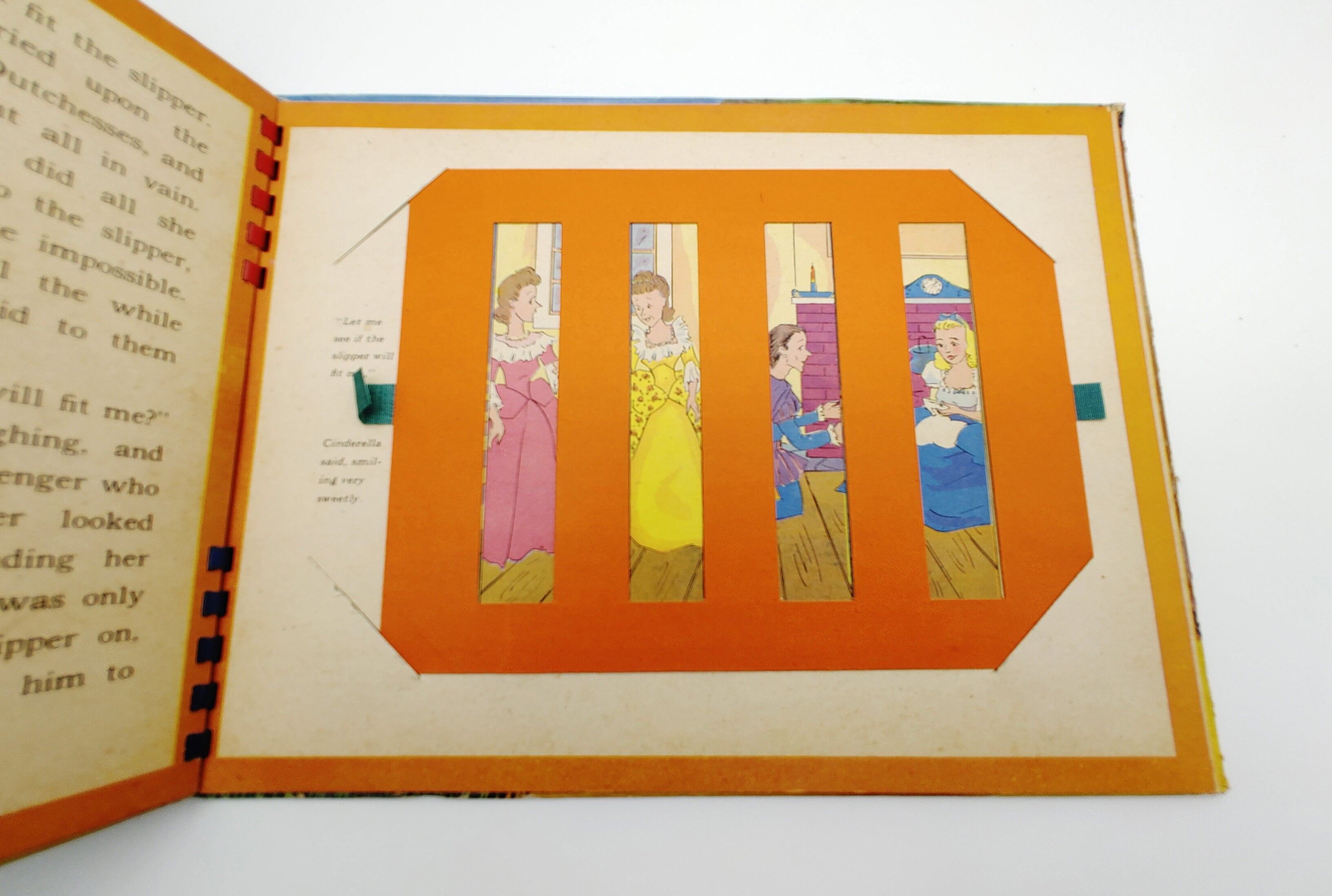 Moveable featuring Cinderella and the ugly stepsisters from the first edition of Emma McKean's Cinderella (1943)